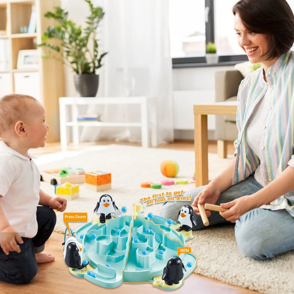 لعبة طاولة البطاريق على الجليد للأطفال